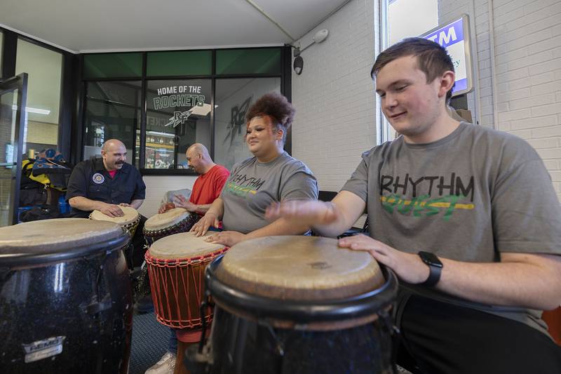 Rock Falls High School students Alliah Haines and Braeden Thome literally try their hands at drumming Sunday, Feb. 26, 2023. Instructor Adrian Velasquez offered instruction on the technique at the school’s Percussion Palooza.