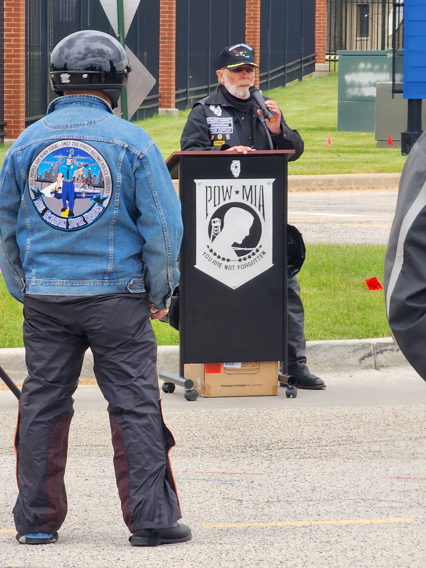 Retired U.S. Army Col. Wayne Kirkpatrick, board chairman of Rolling Thunder Illinois Chapter 2, addresses participants before the 2024 Memorial Day weekend ride for POW/MIA awareness and remembrance.