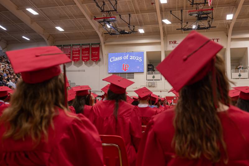 Students wait for the graduation ceremony to begin at the LaSalle-Peru Township High School Class of 2025 commencement ceremony on Thursday, May 15, 2025 in Sellett Gymnasium.