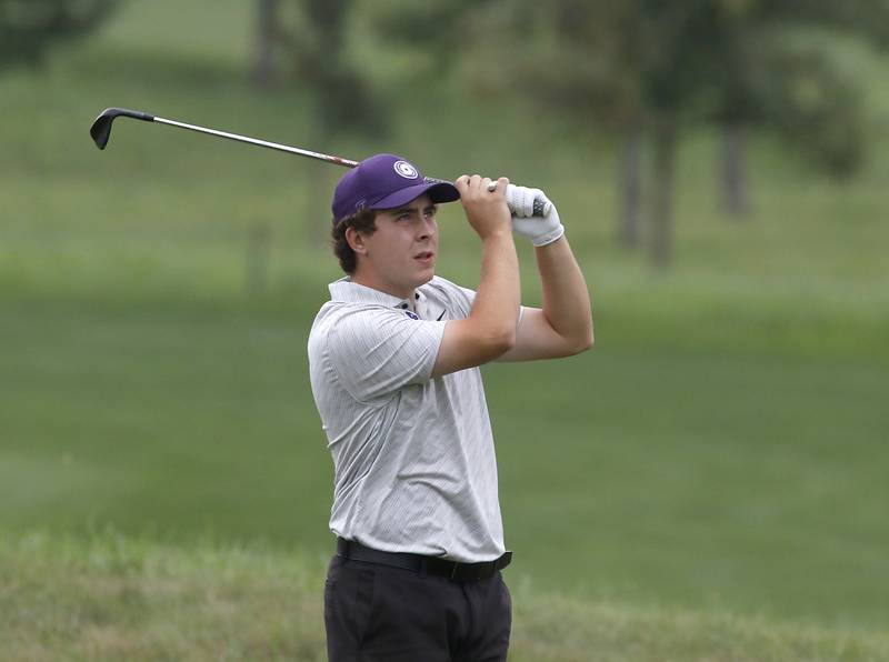 Hampshire’s Eric Brown watches his fairway shot on the seventh hole during the IHSA Class 3A Hampshire Regional golf tournament on Wednesday, Sept. 27, 2023, at Randall Oaks Golf Club in West Dundee.