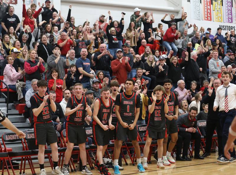 Members of the Indian Creek boys basketball team react with fans late in the 4th quarter after scoring against Marquette during the Class 1A Sectional game on Friday, March 6, 2026 at Amboy High School.