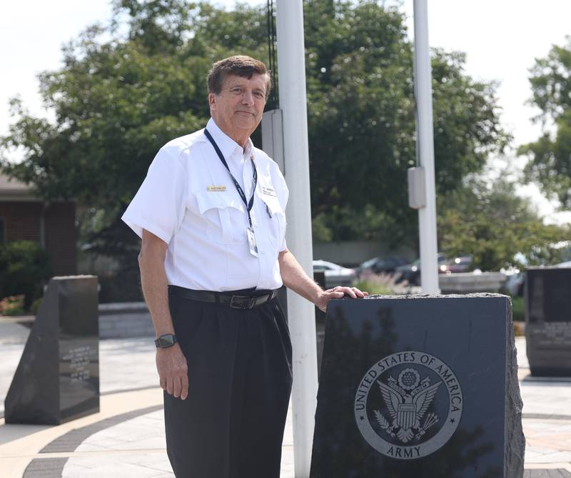Skip Hoechbauer, veteran of the US Army, poses for a photo at the veterans memorial outside Lightways Hospice and Serious Illness Care on Wednesday, August 14, 2024 in Joliet.