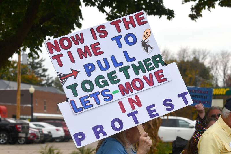 There were a variety of signs carried by demonstrators on Saturday, Oct. 18, 2025 at the No Kings rally on the Ogle County Courthouse square in Oregon, Illinois to protest actions and decisions by President Donald Trump and his administration.