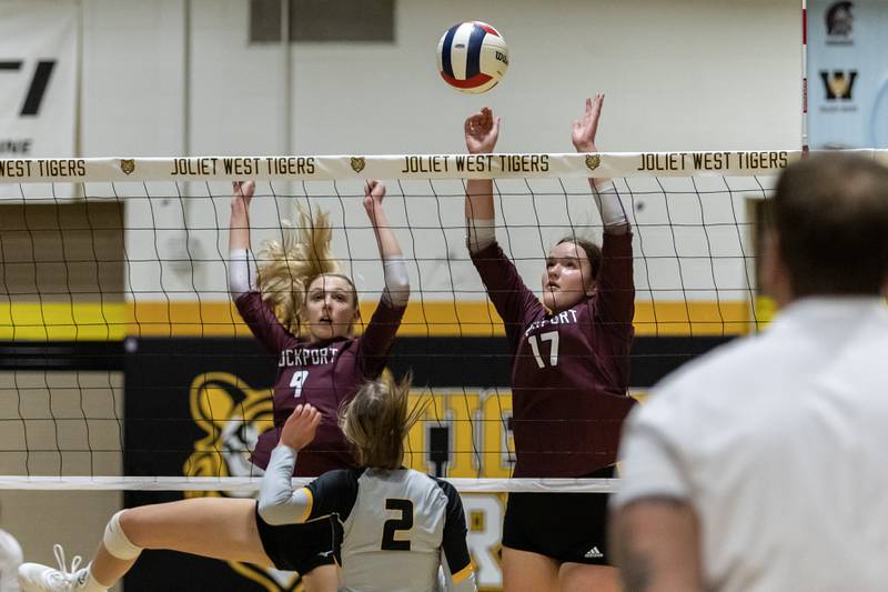 Lockport's Sara Mcgraw and Bridget Ferriter attempt to block a hit from Joliet West's Lexie Grevengoed during a 4A Sectional Finals varsity volleyball game at Joliet West on Nov. 6, 2025.