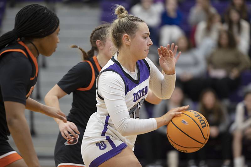 Dixon’s Reese Dambman drives to the hoop against Byron Saturday, Dec. 27, at the Duchesses Basketball Christmas Classic.