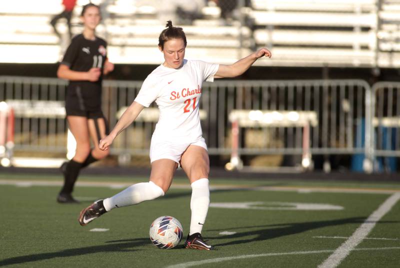 St. Charles East’s Kara Machala kicks the ball during a game at Wheaton Warrenville South on Tuesday, April 18, 2023.