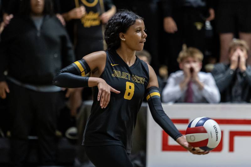 Joliet West's Eden Eyassu serves during a 4A Sectional Finals varsity volleyball game against Lockport at Joliet West on Nov. 6, 2025.