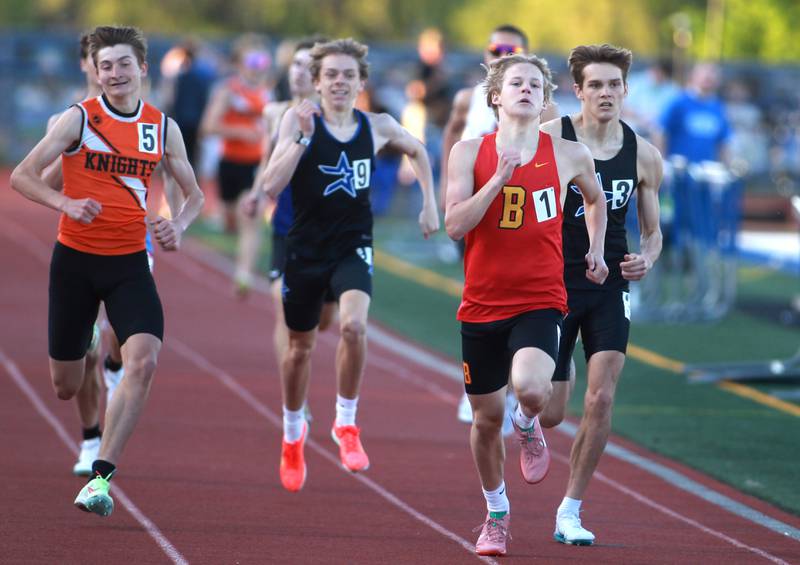 Batavia’s Edward Polaski comes in first in the second heat of the 800-meter run during the Kane County boys track and field championships on Friday, May 9, 2025 at St. Charles North.