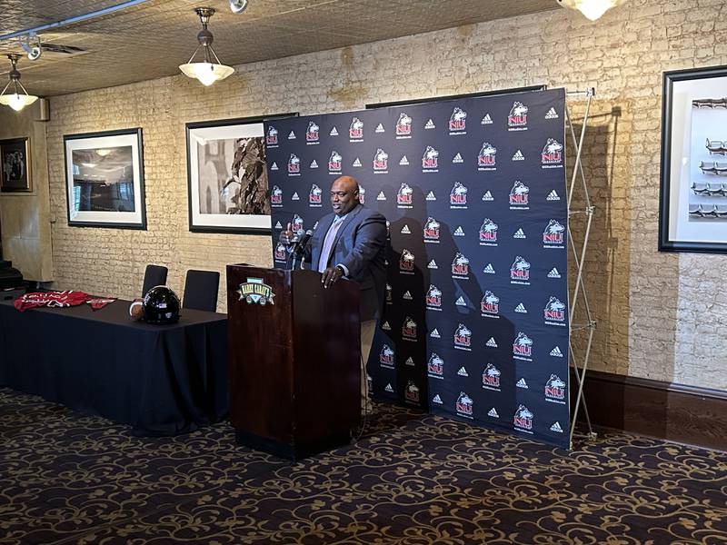 Northern Illinois coach Thomas Hammock speaks with reporters on Monday during NIU's Chicago Media Day at Harry Caray's Kinzie Street location. Photo by Michal Dwojak
