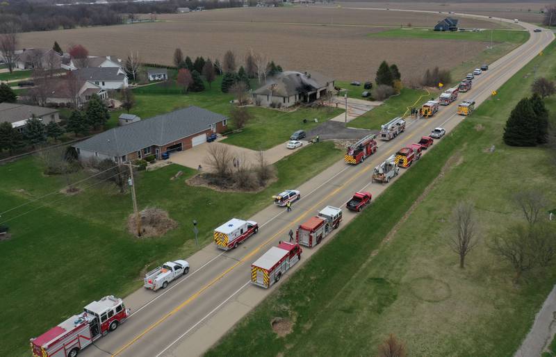 Dozens of  fire apparatus vehicles respond of a structure fire in the 600 block of U.S. Route 6 on Tuesday, April 1, 2025 in La Salle. Fire departments from Peru, La Salle, Utica, Troy Grove, Wallace, Spring Valley and Oglesby were dispatched just before 2:30 to a one-story duplex home. Traffic was shut down on U.S, .Route 6 in borh directions from Richard Hallett Road to North 29th road.