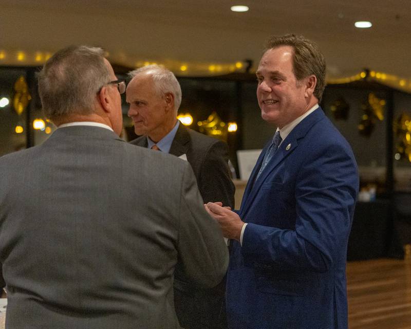 Geneva Mayor Kevin Burns talks with attendees at the Geneva Chamber of Commerce Awards Dinner on Thursday, Nov. 6, 2025.