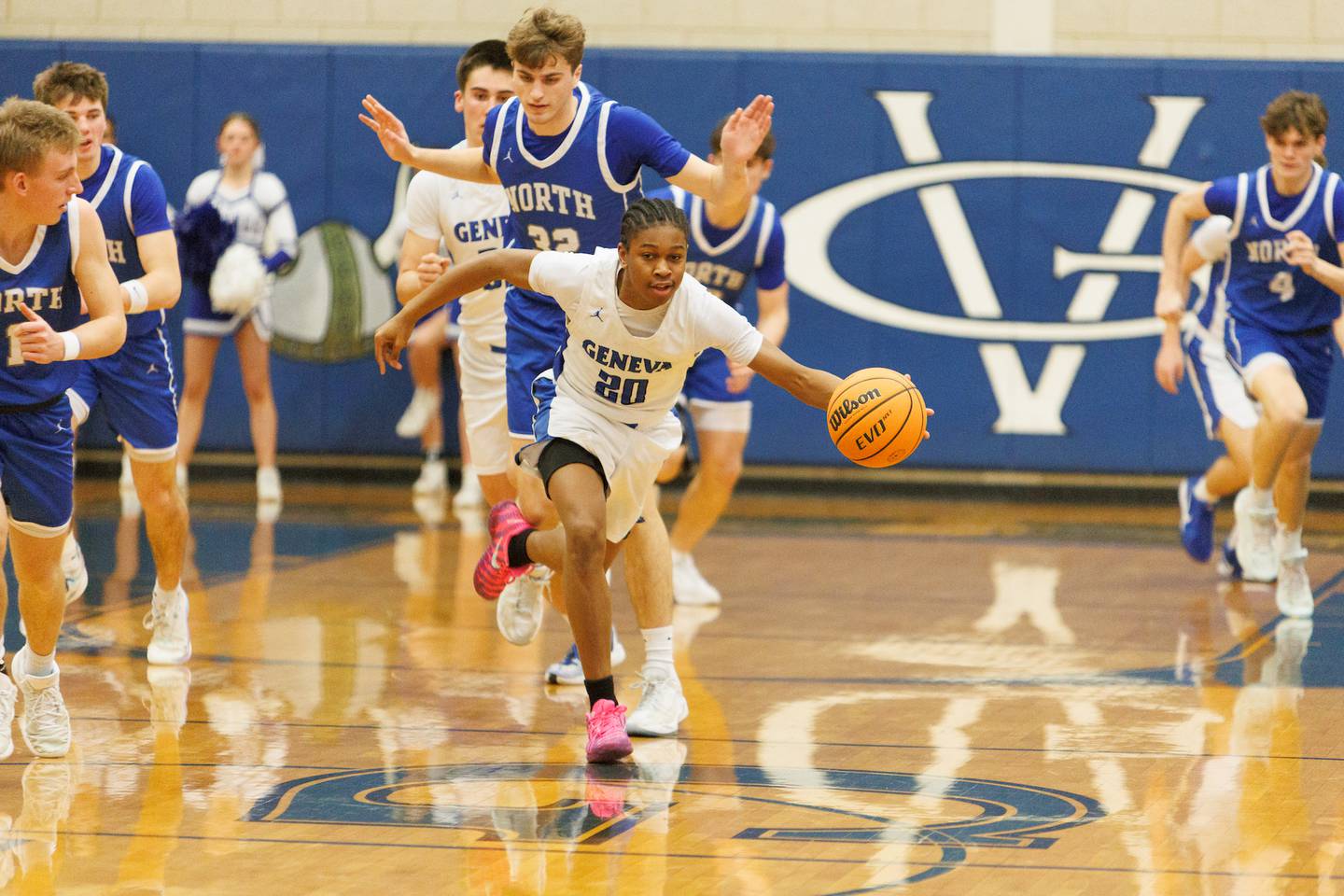 Geneva's David Udoiwod comes up with the loose ball infant of Wheaton North's Ben Gillmar on Friday, Feb.13,2026 in Geneva.