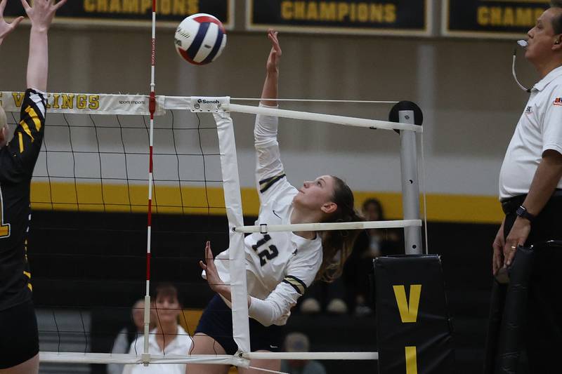 Lemont’s Izabella Kowalczyk hits a shot against St. Laurence in the Class 3A St. Laurence Sectional championship on Thursday, Nov. 7, 2024 in Burbank.