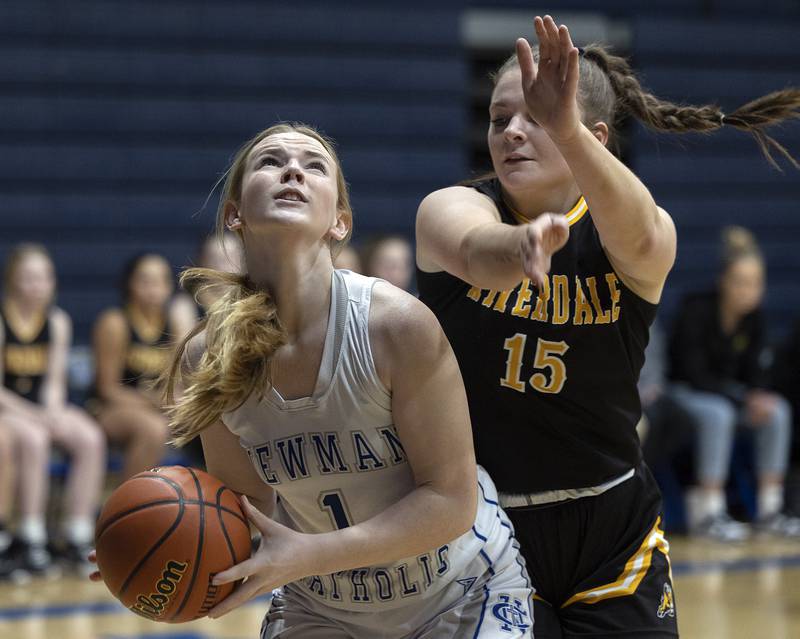 Newman’s Jessalin Johns looks to put up a shot while being guarded by Riverdale’s Crystal Craigmiles Thursday, Feb. 2, 2023.