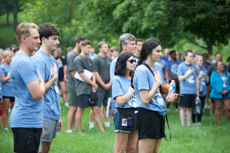 The Hardy Family during the National Anthem before The Amazing Race Hardy Strong at Mt. St. Mary Park in St. Charles on Saturday, August 5, 2023