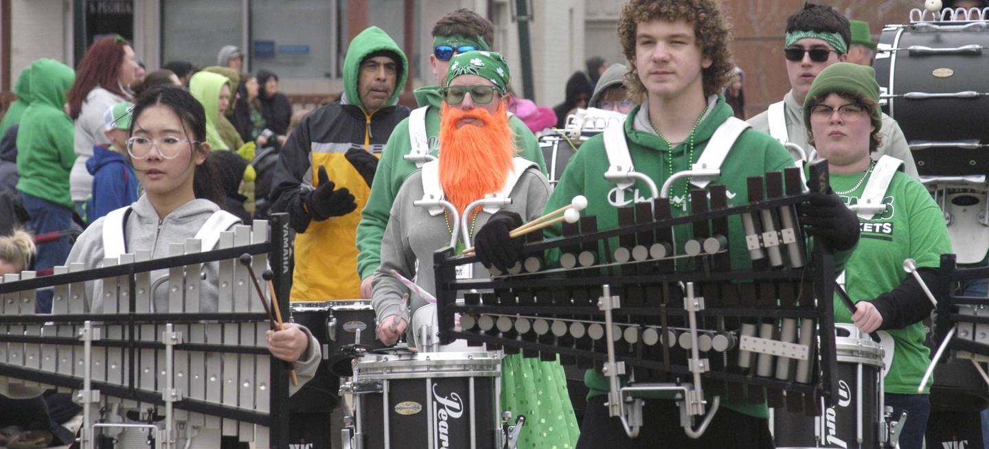The Rock Falls High School band marches in Dixon's St. Patrick's Day parade Saturday, March 15, 2025.