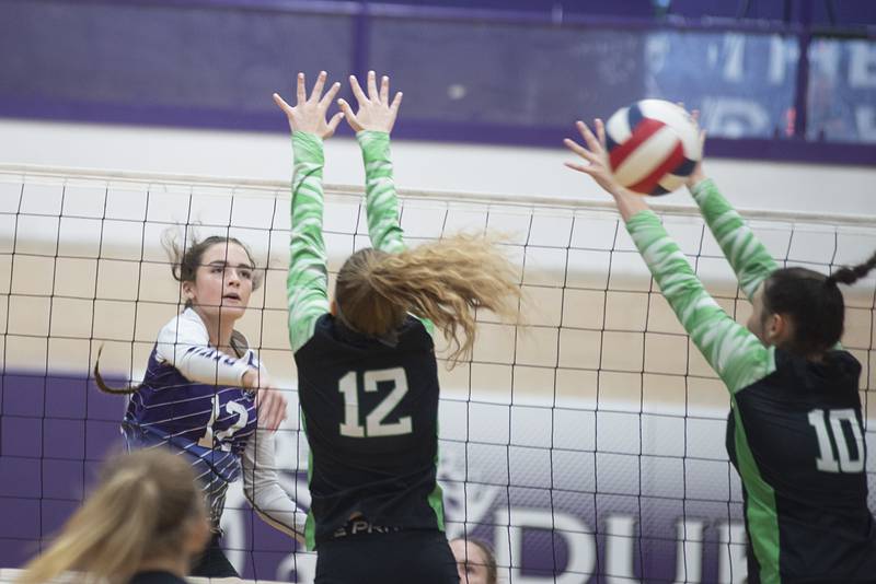 Dixon’s Joey Brumbly hammers a shot against Alleman on Wednesday, Sept. 7, 2022.