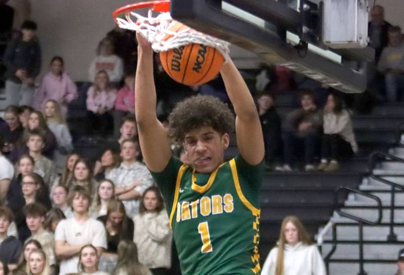 Crystal Lake South’s Noah Cook slams the ball for a dunk in varsity boys basketball on Friday, Feb. 20, 2026, at McHenry High School in McHenry.