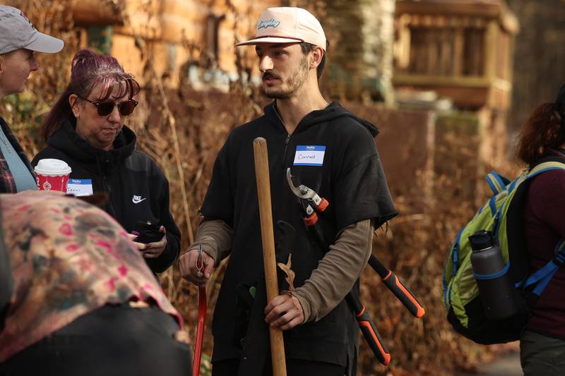 Conrad Bolster, of Joliet, brought his own tools for the nature preservation event to restore light to the woodland floor in Pilcher Park on Sunday, Nov. 10, 2024 in Joliet.