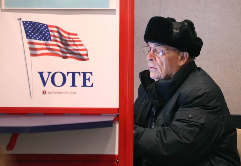 Richard Dowen, from DeKalb, casts his ballot in the primary election Tuesday, March 17, 2026, at the DeKalb County Administration Building in Sycamore.