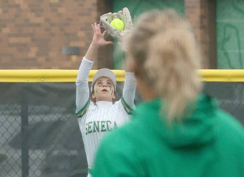 Seneca's Ameliah Weber makes a catch in right field against Geneseo on Thursday, March 12, 2026 at Seneca High School.