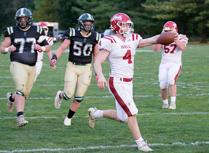 Hall's Mac Resetich (4) runs the ball into the end zone as he gets by St. Bede's Sam Bima (77) and Jake Miglorini (50) on Saturday, Oct. 15, 2022 at the Academy in Peru.