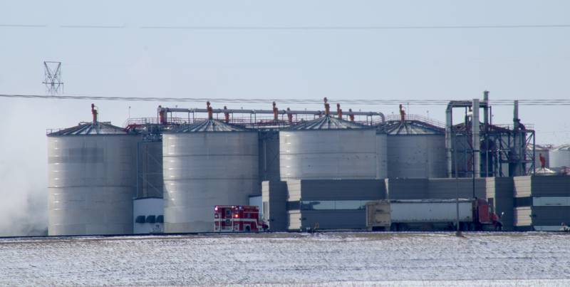 An emergency vehicle speeds to Marquis Industrial Complex through the east gate road on Saturday morning, Feb. 4, 2023, in rural Hennepin.