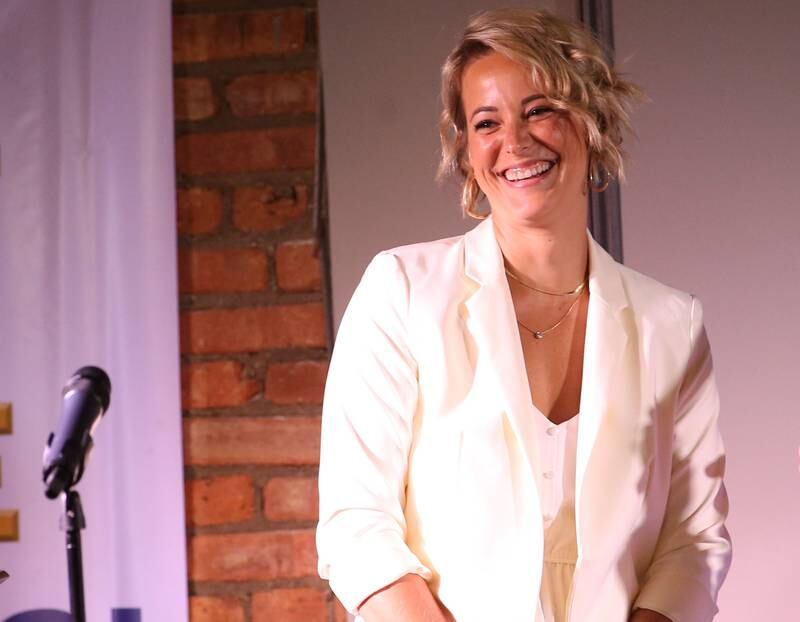 Tori (Bunzell) Kueker smiles while being introduced on stage during the Shaw Media Illinois Valley Sports Hall of Fame on Thursday, June 8, 2023 at the Auditorium Ballroom in La Salle. Bunzell was an outstanding softball pitcher for L-P High School and set records while pitching for Quincy University.