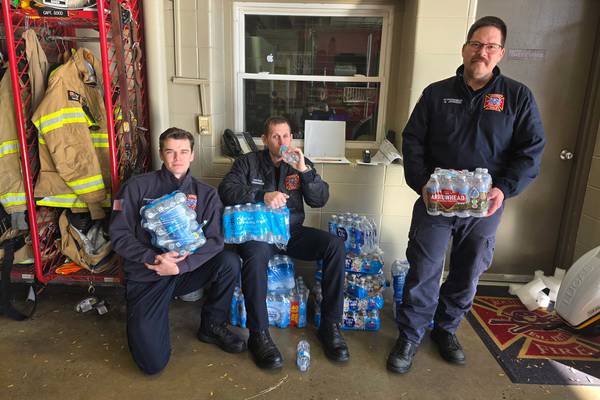 Rochelle library, DAR honor First Responders Day with quilts, water donation