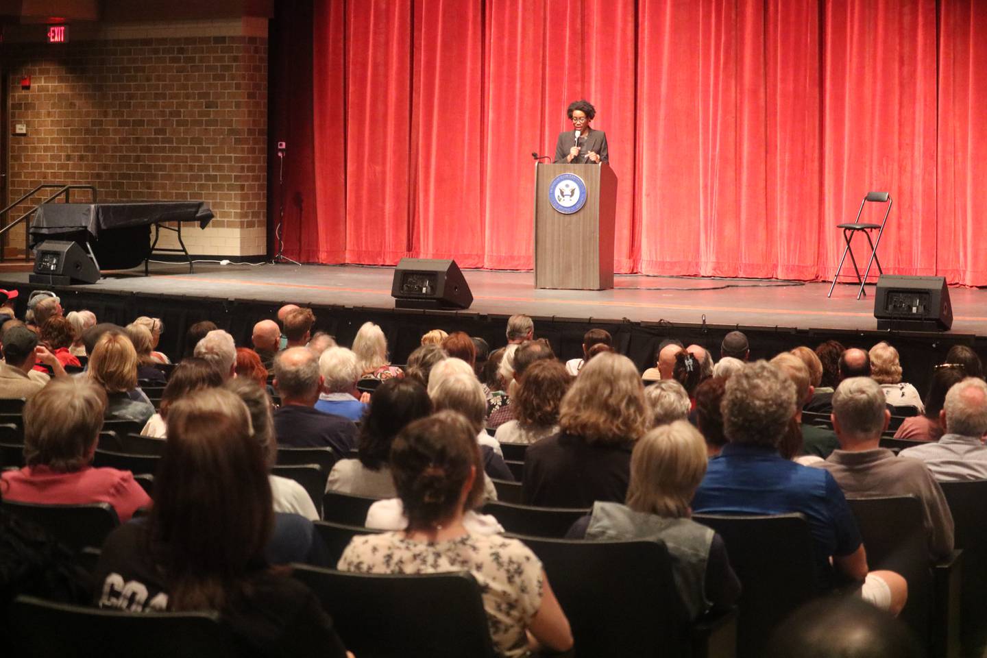 U.S. Rep. Lauren Underwood, D-Naperville, addresses the audience on hand April 24, 2025, for her town hall at DeKalb High School.