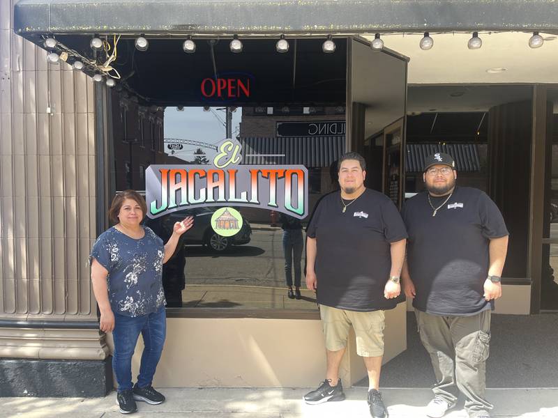 Owner's Maria Rocha (Left) and her two sons, Antonia and Octavio Flores (Right) outside their restaurant, El Jacalito, at its new location in Downtown Sterling.