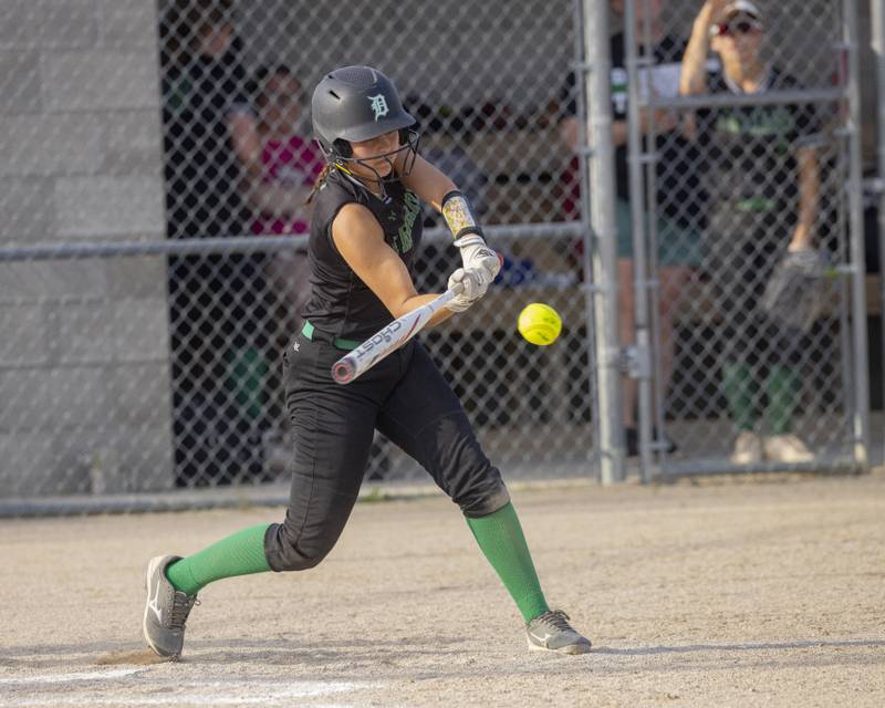Madi Ely of Dwight High School connects with the ball for a double against Serena High School during the Class 1A Sectional semifinal game at Woodland High School on May 21, 2024.