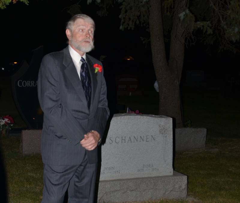 Standing amid Tschannen family headstones, John Aman of Montgomery portrays Herbert Tschannen, a Swiss immigrant during the Village of Montgomery’s annual cemetery walk at Riverside Cemetery Wednesday, Oct. 5. The free event is sponsored by the village’s Historic Preservation Commission.