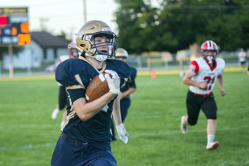 Polo’s Brock Soltow picks up big yards Friday, Aug. 26, 2022 against Amboy.