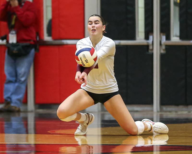 Oswego's Laila Lawson (3) digs a ball during Class 4A Bolingbrook Sectional final match between Lockport at Oswego.  Nov 7, 2024  in Bolingbrook.