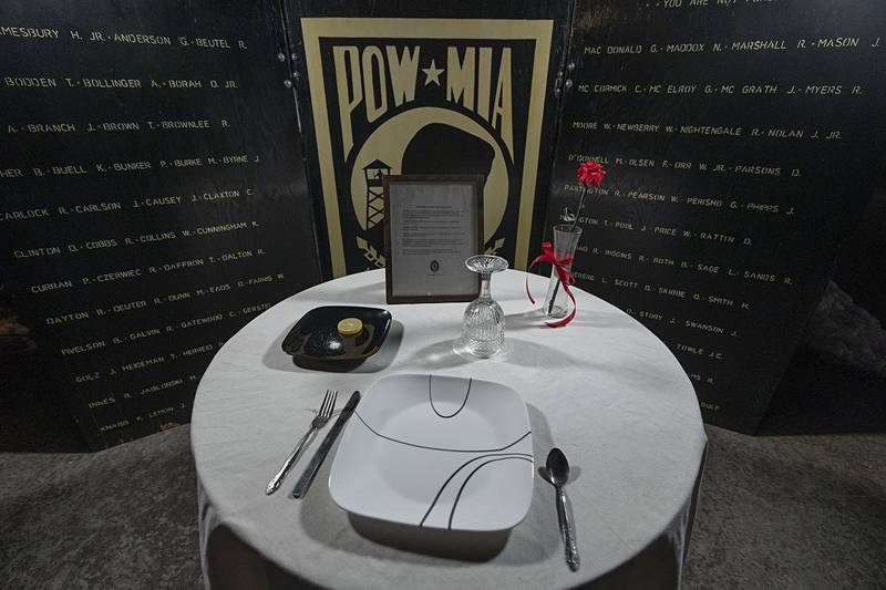 Each part of a table setting on display at Veterans Memorial Park in Dixon has significance to the lost and missing soldiers who are POW/MIAs.