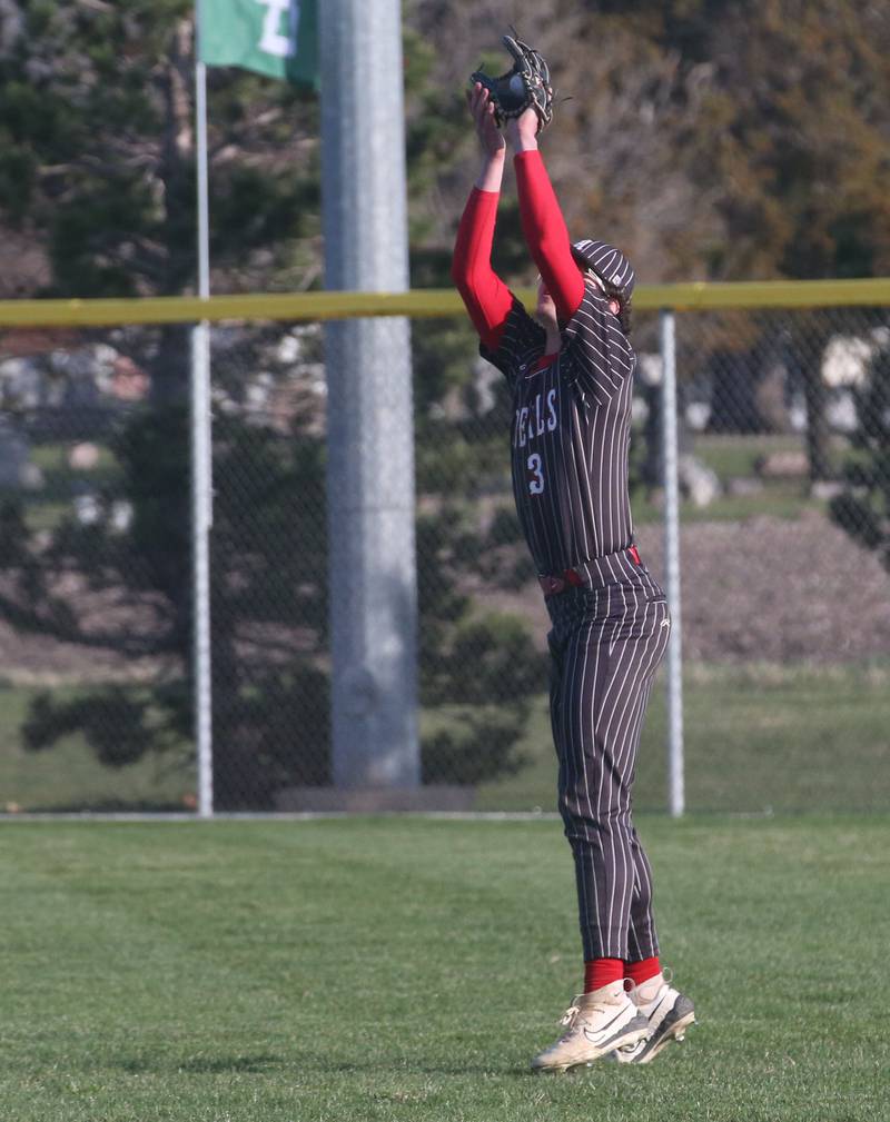 Hall's Jack Jablonski squeezes his glove to make a catch in right field against St. Bede on Monday, March 31, 2025 at Schweickert Stadium in Peru.