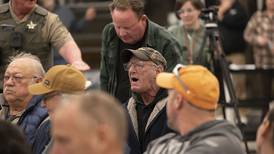 Photos: Coloma Township meeting heats up during tax hike discussion