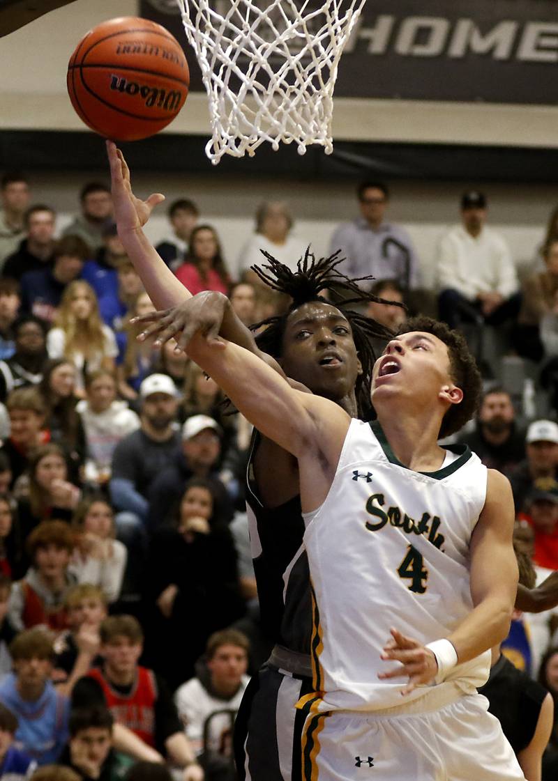 Crystal Lake South's AJ Demirov shoots the ball in front of Kaneland's Evan Ross during the IHSA Class 3A Kaneland Boys Basketball Sectional championship game on Friday, March 1, 2024, at Kaneland High School in Maple Park.