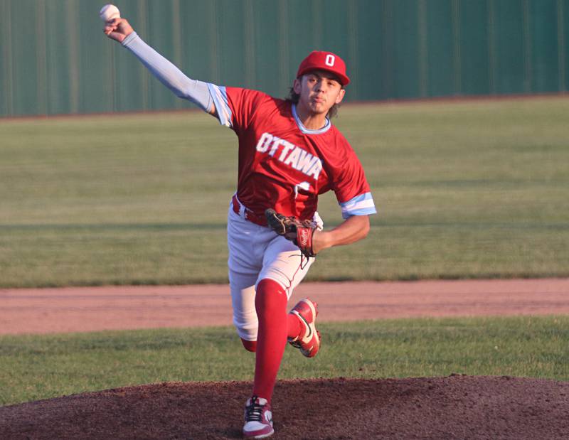 Ottawa pitcher Cam Loomis lets go of a pitch to Plano during the Class 3A Regional semifinal game on Wednesday, May 22, 2024 at Huby Sarver Field in La Salle.