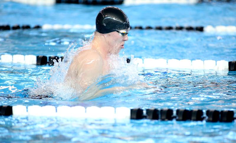 Naperville North’s Mason Hofmann swims the breastroke leg of the 200-meter medley relay consolation heat during the IHSA Boys State Championships on Saturday, March 1, 2025 at the FMC Natatorium in Westmont.