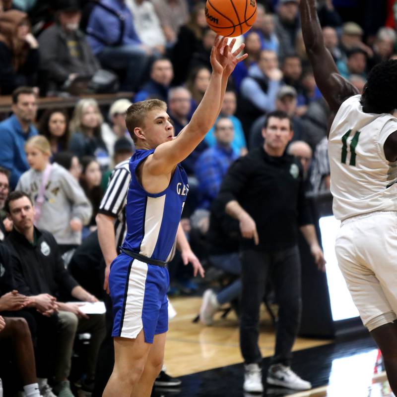 Geneva’s Nelson Wendell attempts three points during the Class 4A St. Charles East Sectional final against Glenbard West on Friday, March 7, 2025 in St. Charles.