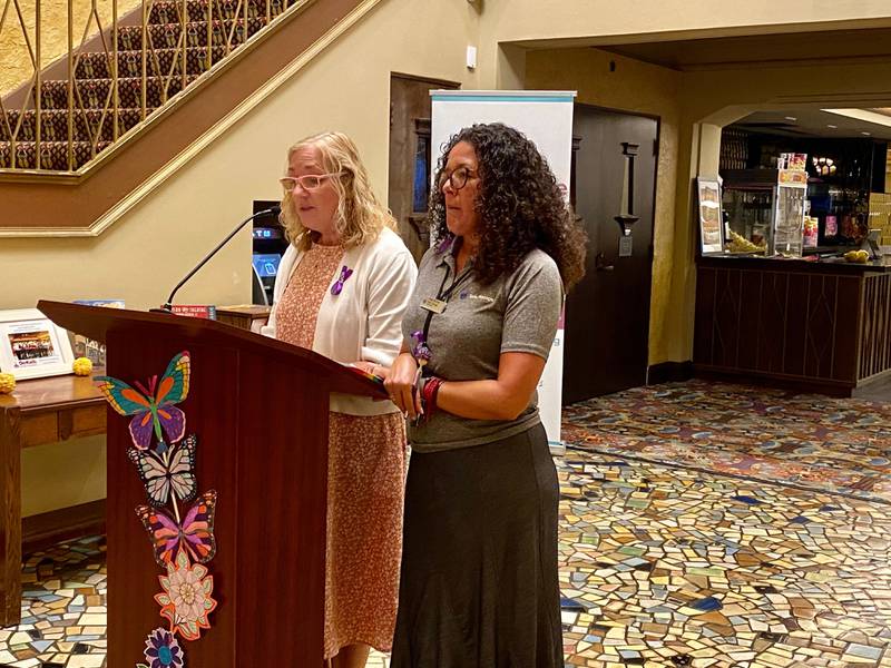 Lisa C. (left) and Erika M. (right), are both adult domestic violence counselors at Safe Passage Inc. They gave remarks at the annual Safe Passage Domestic Violence Candlelight Vigil and Survivor Speak-Out inside the Egyptian Theatre, 135 N. Second St. in downtown DeKalb on Monday, Oct. 2, 2023.
