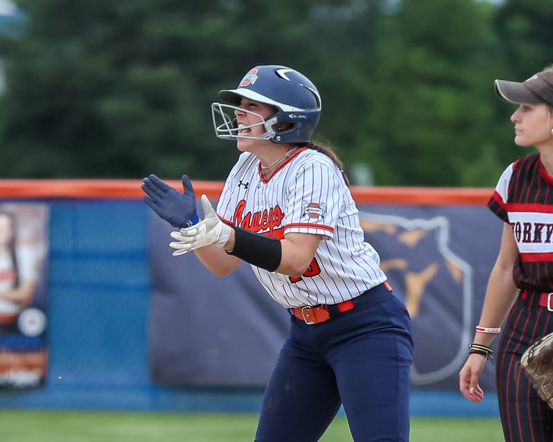 Oswego's Rikka Ludvigson (16) celebrates at second base after hitting a double during Class 4A Oswego Regional final softball game between Yorkville at Oswego. May 24th, 2024.