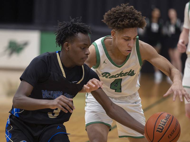 Rock Falls’ Devin Tanton-DeJesus and Rockford Christian’s JT Samuels vie for the ball Tuesday, Jan. 30, 2024 at Rock Falls High School.
