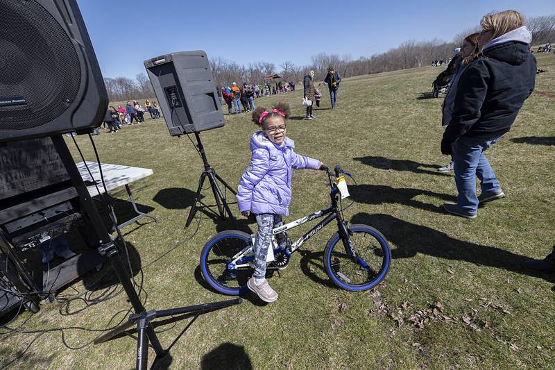 Aubreigh Essex, 6, of Franklin Grove tries on her new bike Saturday, March 23, 2024 at Sterling Park District Egg Hunt. Aubreigh was one of four kids to receive a new ride.