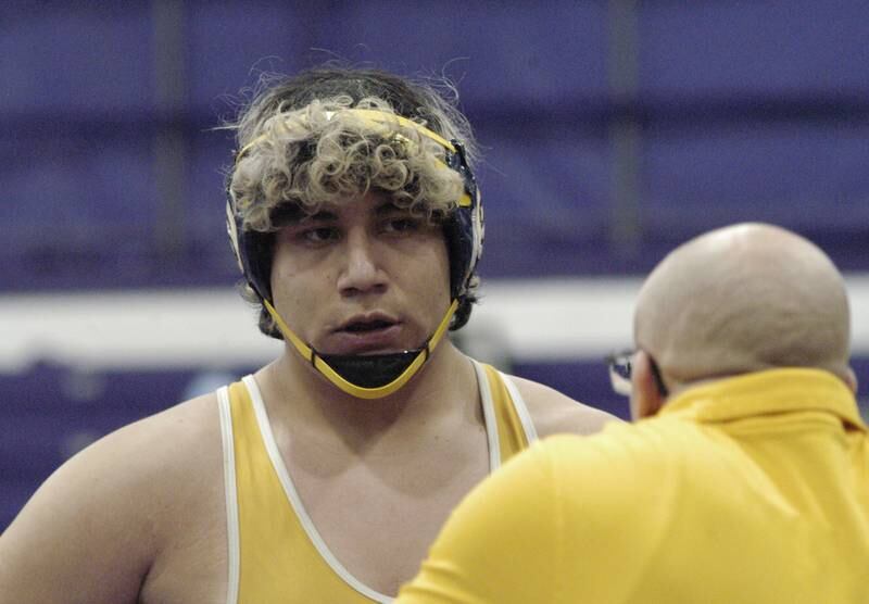 Sterling's Oswaldo Navarro gets advice from a coach during the Class 2A Dixon Regional on Saturday, Feb. 8, 2025 at Lancaster Gym in Dixon.