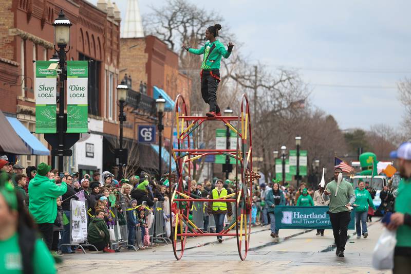 Sam the Wild Wheeler performs for the crowds at the annual Plainfield Hometown Irish Parade on Sunday, March 15, 2026 in Plainfield.
