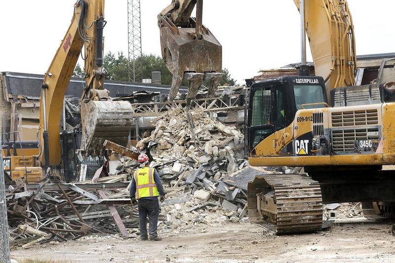 A crew from Alpine Demolition works Monday, Oct. 17, 2016 at the site of the former Ambutal health care facility at 4900 S. Ill. Rt. 31 in Crystal Lake. The facility first opened in 1978 by Sherman Hospital.