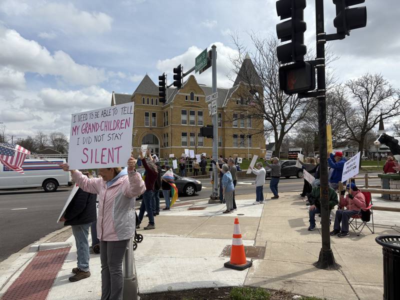 Protestors oppose President Donald Trump in Harvard April 19, 2025.